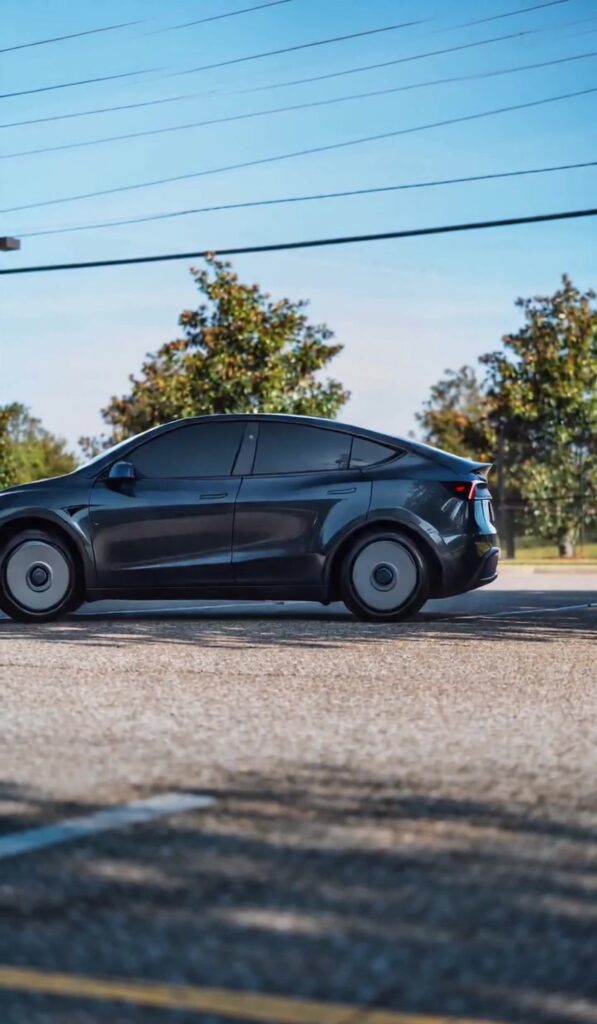 Tesla Model Y with wheel covers installed — TPMS compatibility guide