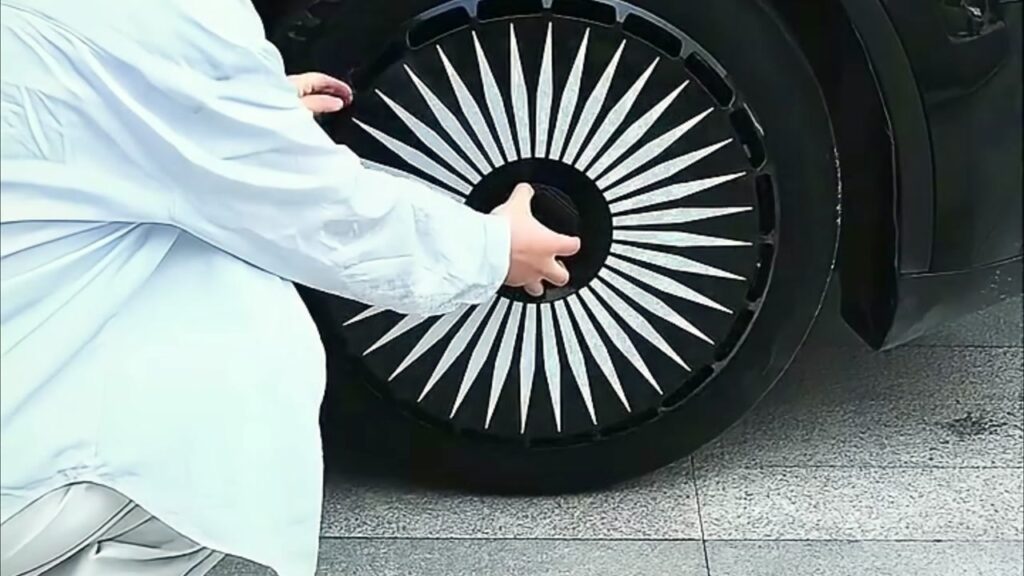 Tesla wheel cover installation cost guide showing DIY install on Model Y