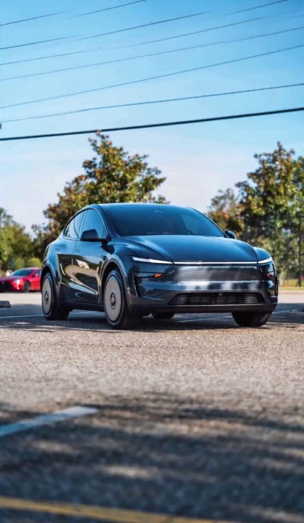 Tesla Model Y with aero wheel covers installed, showing airflow path for tesla wheel cover brake cooling